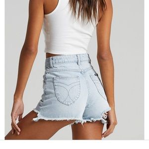 Rolla’s light blue distressed duster shorts